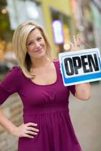 Blonde woman Open sign Blonde woman Open sign